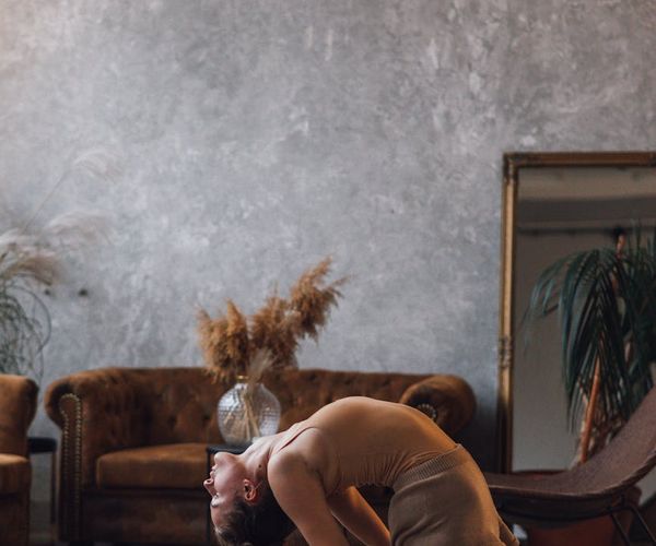 A serene setting for yoga practice with mat and props, ready for a session.